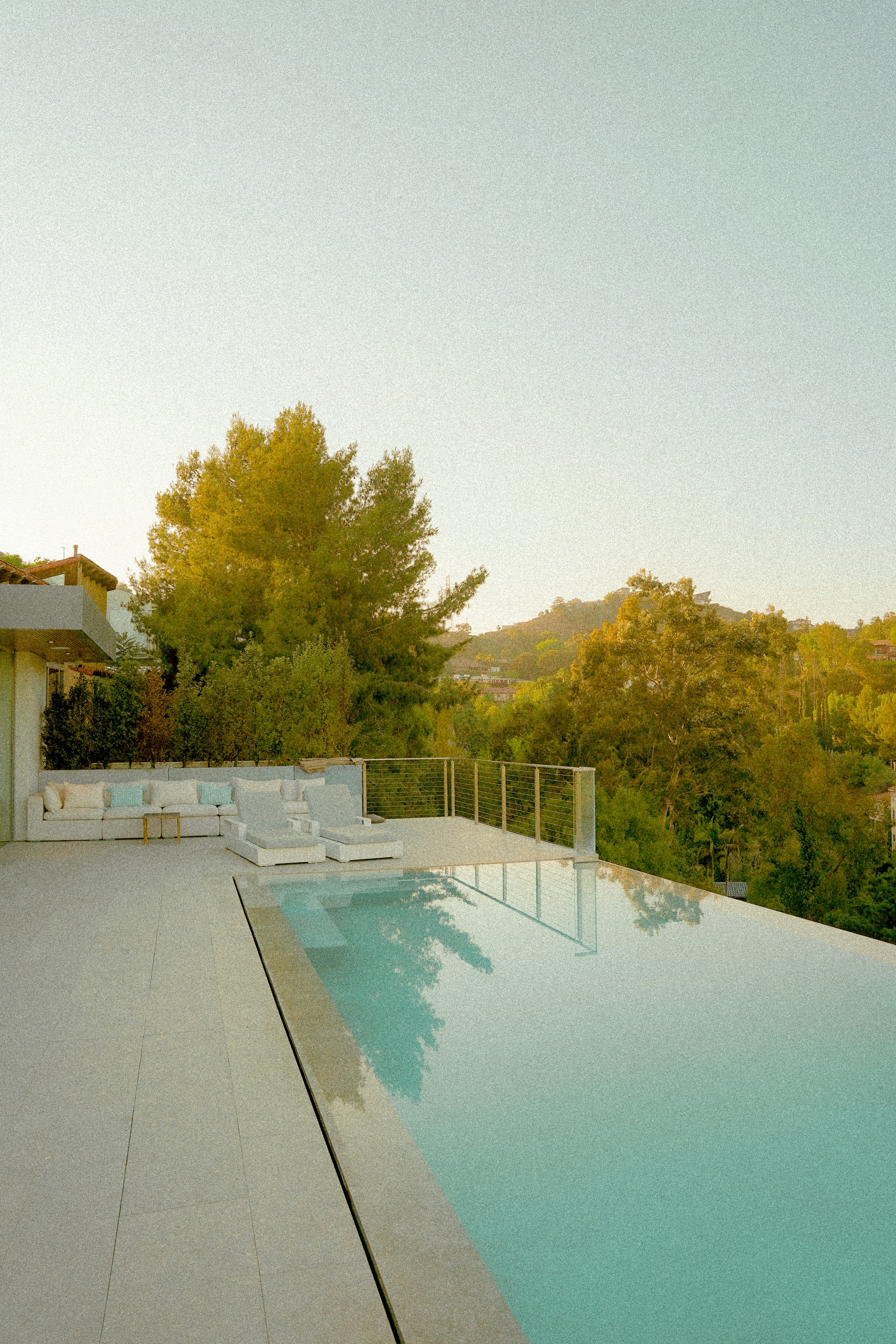 Rooftop infinity pool at sunset