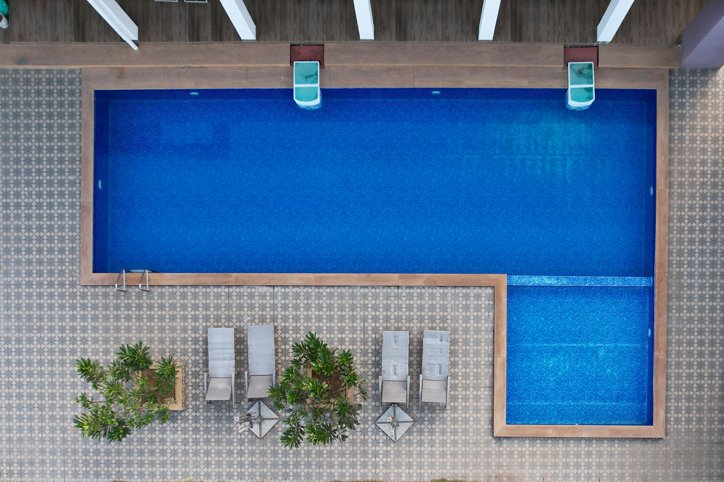 Aerial view of curved estate pool